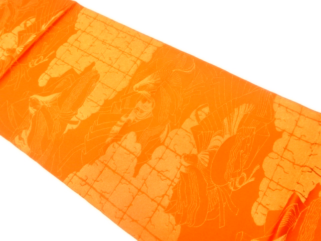  雲に人物・格子模様織出し丸帯